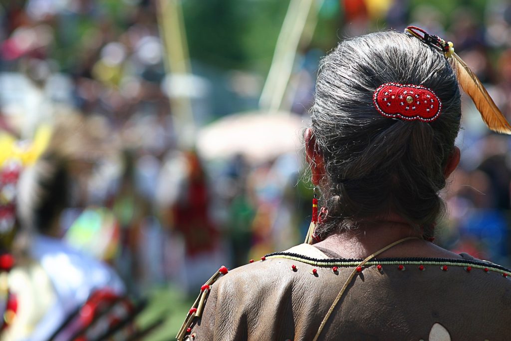 indigenous woman at a powwow event