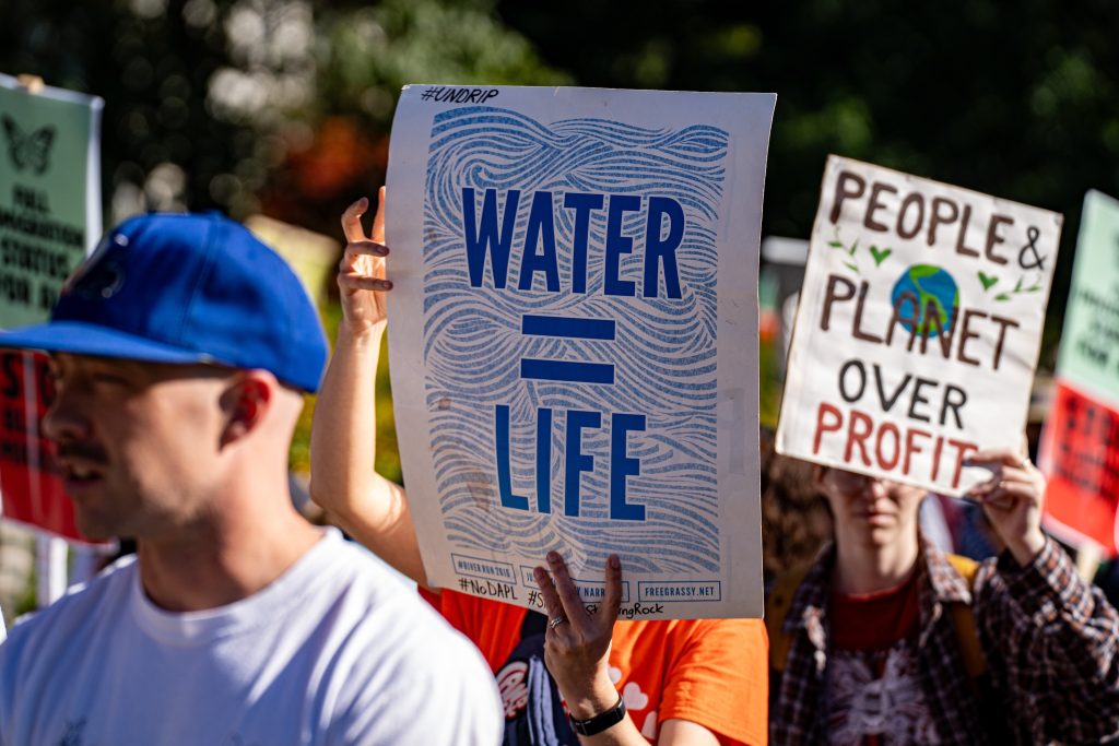 water rights sign march protest toronto canada undrip